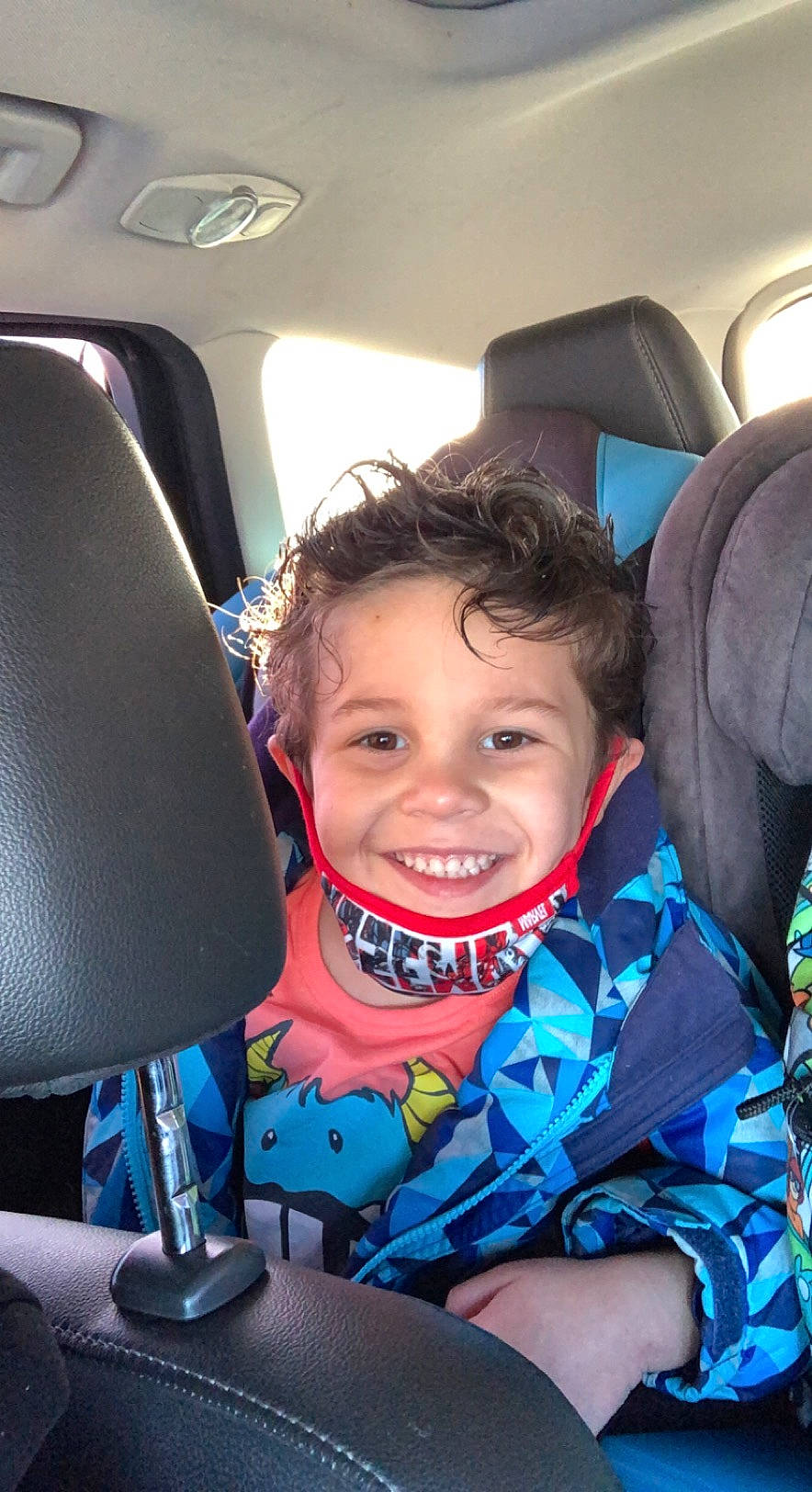 Christopher is registered to the contest to win money with this photo: air_travel, auto_part, automotive_design, car_seat, car_seat_cover, comfort, electric_blue, family_car, fun, happy, head_restraint, joy, luxury_vehicle, motor_vehicle, person, personal_protective_equipment, seat_belt, smile, steering_wheel, toddler