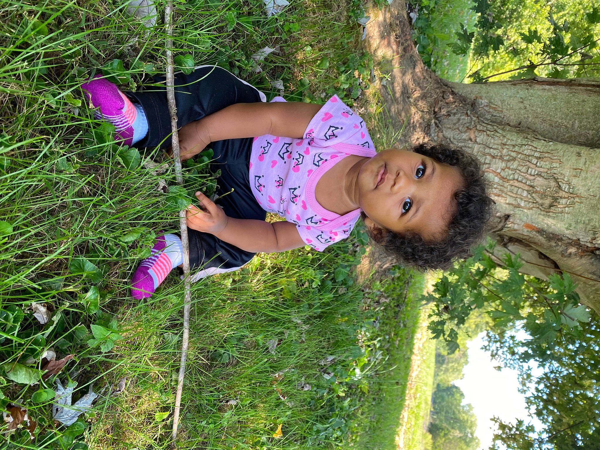 Kaida is registered to the contest to win money with this photo: child, fun, garden, grass, grass_family, grassland, happy, leaf, leisure, magenta, people_in_nature, person, petal, plant, recreation, sandal, shrub, thigh, tree, trunk