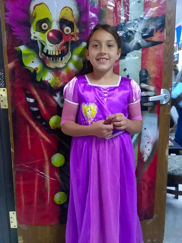 Aaliyah is registered to the contest to win money with this photo: child, costume, day, dress, fun, girl, joy, magenta, person, pink, product, purple, smile