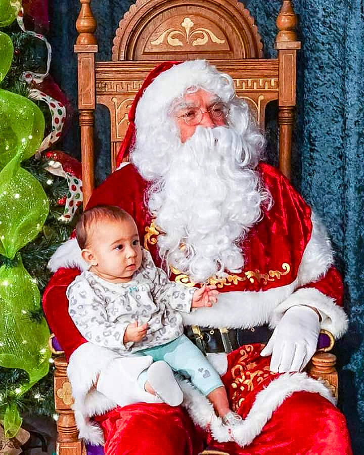 Avery joined the competition — help win amazing prizes! christmas, christmas_decoration, christmas_ornament, fictional_character, holiday, lap, person, santa_claus, toddler, tradition