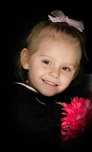 Alicia is registered to the contest to win money with this photo: baby, cheek, child, child_model, face, facial_expression, flower, hair_accessory, head, headgear, headpiece, iris, joy, laugh, person, petal, photography, pink, portrait, portrait_photography