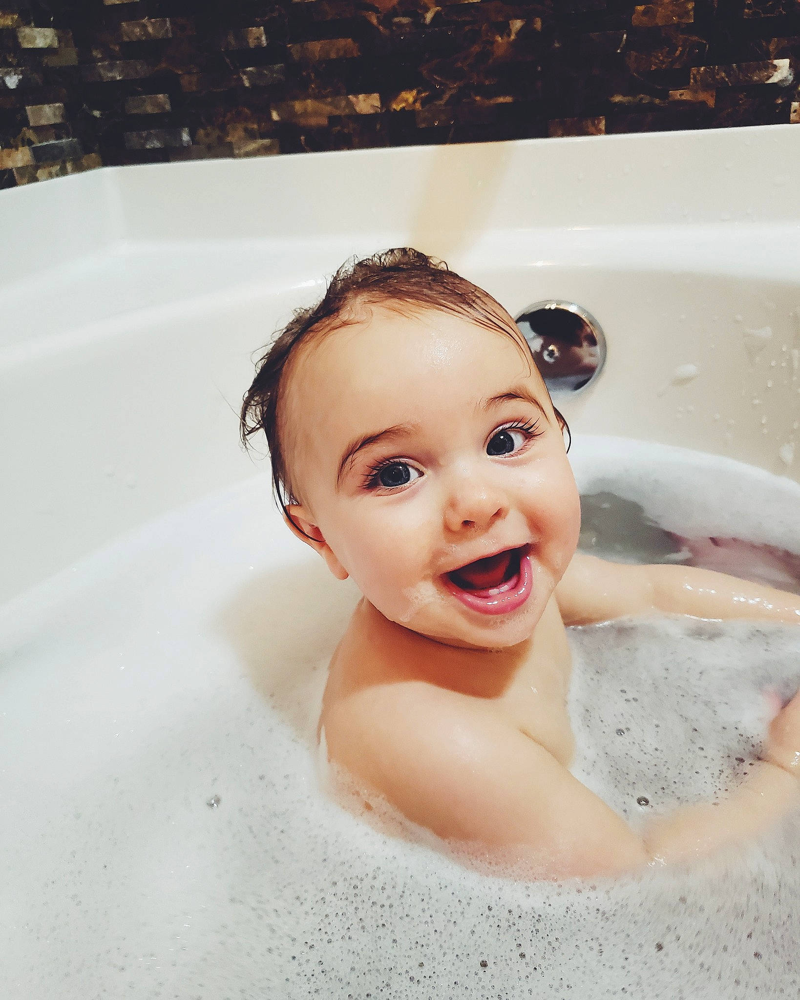 Laura joined the competition — help win amazing prizes! bathing, bathtub, beauty, child, fun, girl, hair_accessory, infant, person, photo_shoot, skin, smile, toddler