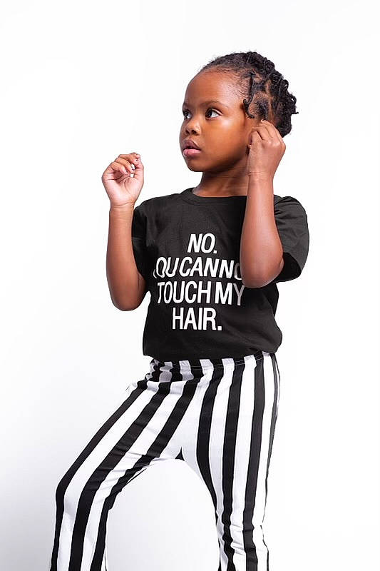 Kyndall is registered to the contest to win money with this photo: afro, audio_equipment, baby_toddler_clothing, black_hair, cornrows, fashion_design, gesture, hairstyle, head, human_body, jewellery, jheri_curl, joint, knee, neck, person, ringlet, sleeve, t_shirt, thigh