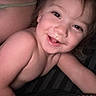 Memphys joined the competition — help win amazing prizes! toddler, child, smile, face, skin, arm, diaper, person, indoors, closeup, happy, messy, cozy, striped, candid, baby, young_child, portrait, human, infant