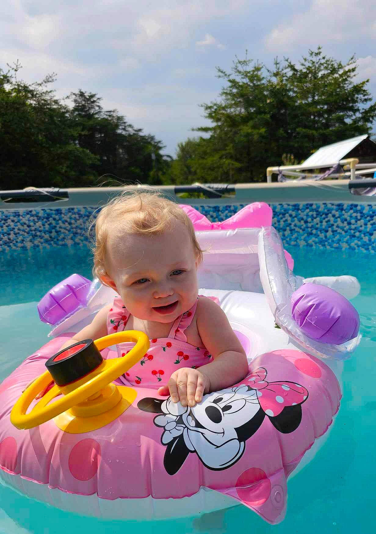 Oaklyn is registered to the contest to win money with this photo: baby, baby_float, baby_products, baby_toddler_clothing, child, cloud, fun, grass, happy, leisure, magenta, person, pink, play, recreation, sky, smile, swimming_pool, toddler, tree