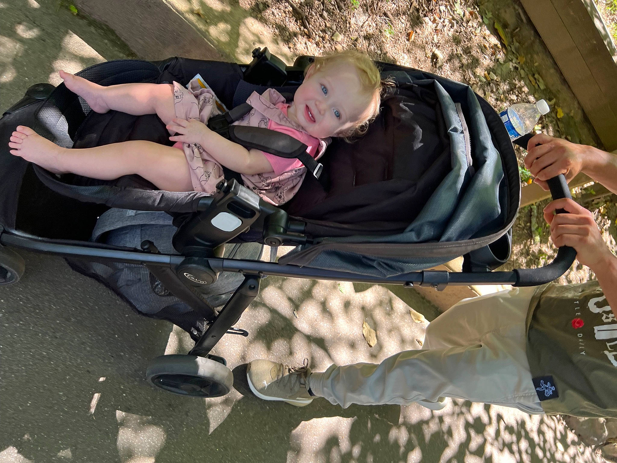 Oaklyn joined the competition — help win amazing prizes! auto_part, baby, baby_carriage, baby_products, comfort, fun, grass, joy, lap, leisure, person, personal_protective_equipment, recreation, sitting, smile, toddler, tree