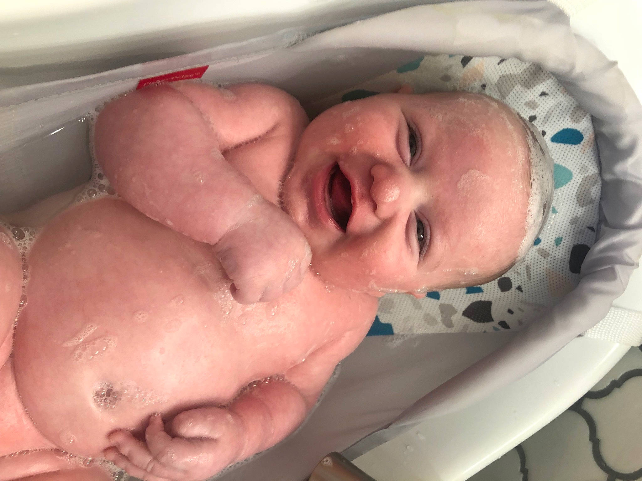 Hayven is registered to the contest to win money with this photo: baby, cheek, chin, comfort, ear, eye, eyebrow, face, finger, head, headgear, headwear, human_body, jaw, lip, mouth, neck, nose, person, skin