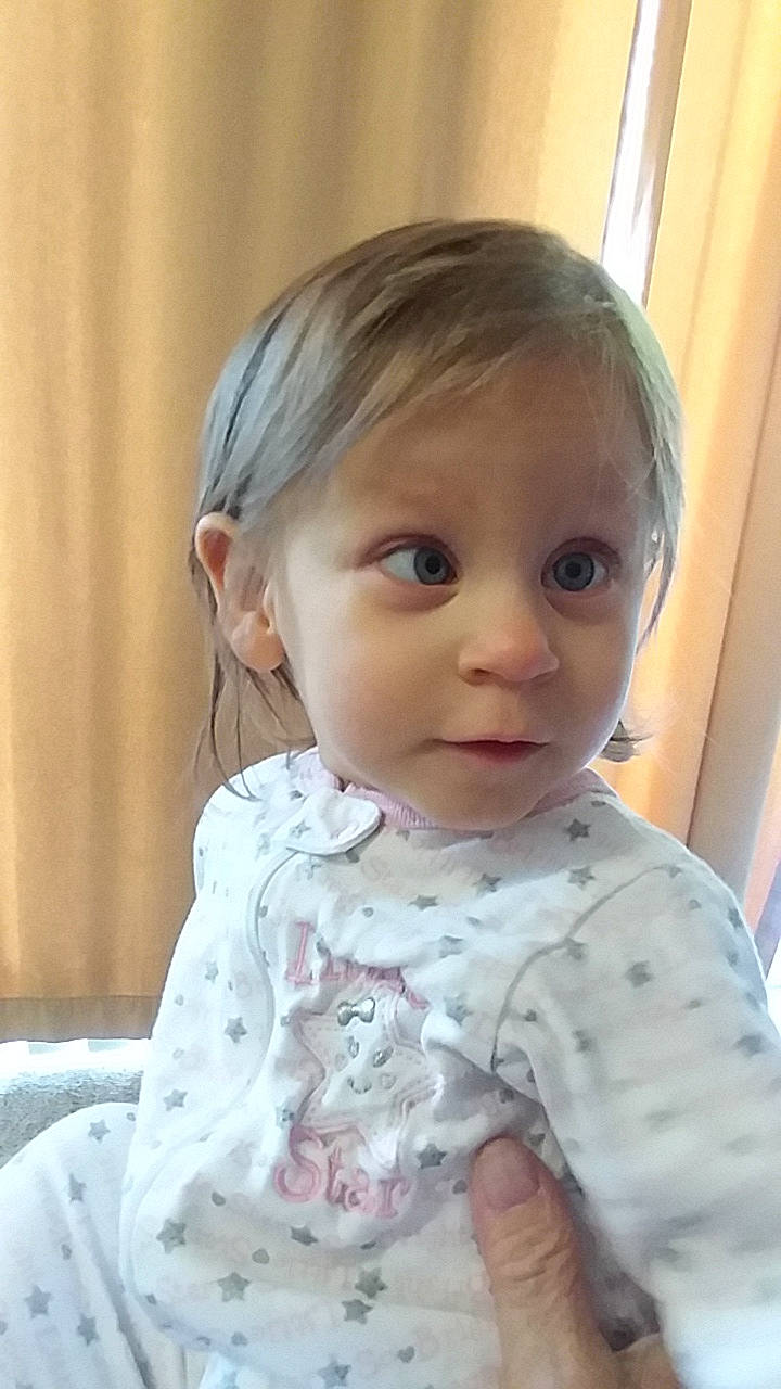 Sarah is registered to the contest to win money with this photo: baby, blond, brown_hair, cheek, child, chin, ear, eye, face, forehead, hair, hairstyle, head, lip, neck, nose, person, skin, smile, toddler