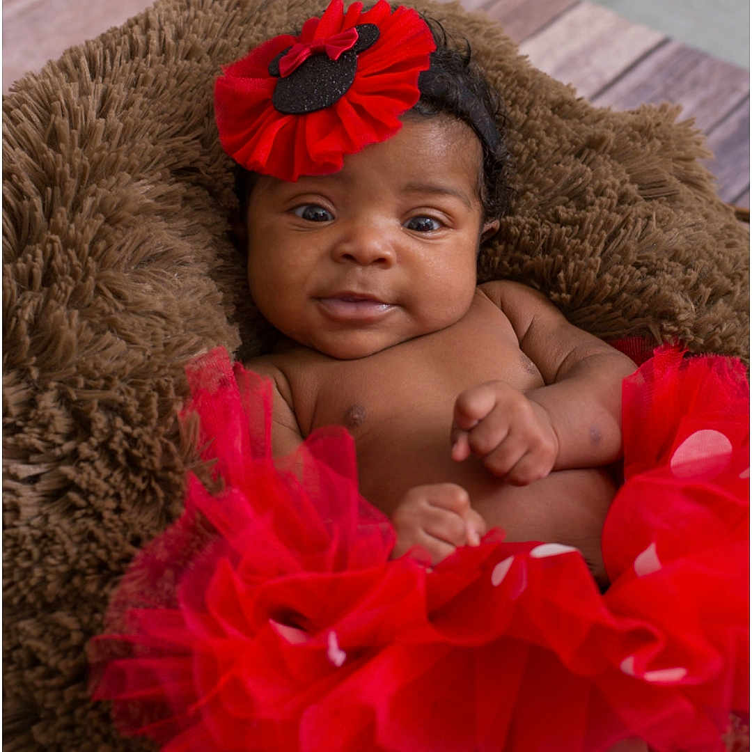 Cerenity joined the competition — help win amazing prizes! baby, baby_bloomers, baby_toddler_clothing, child, child_model, costume, costume_accessory, fashion_accessory, flower, hair_accessory, headband, headgear, headpiece, person, petal, photography, pink, plant, red, skin
