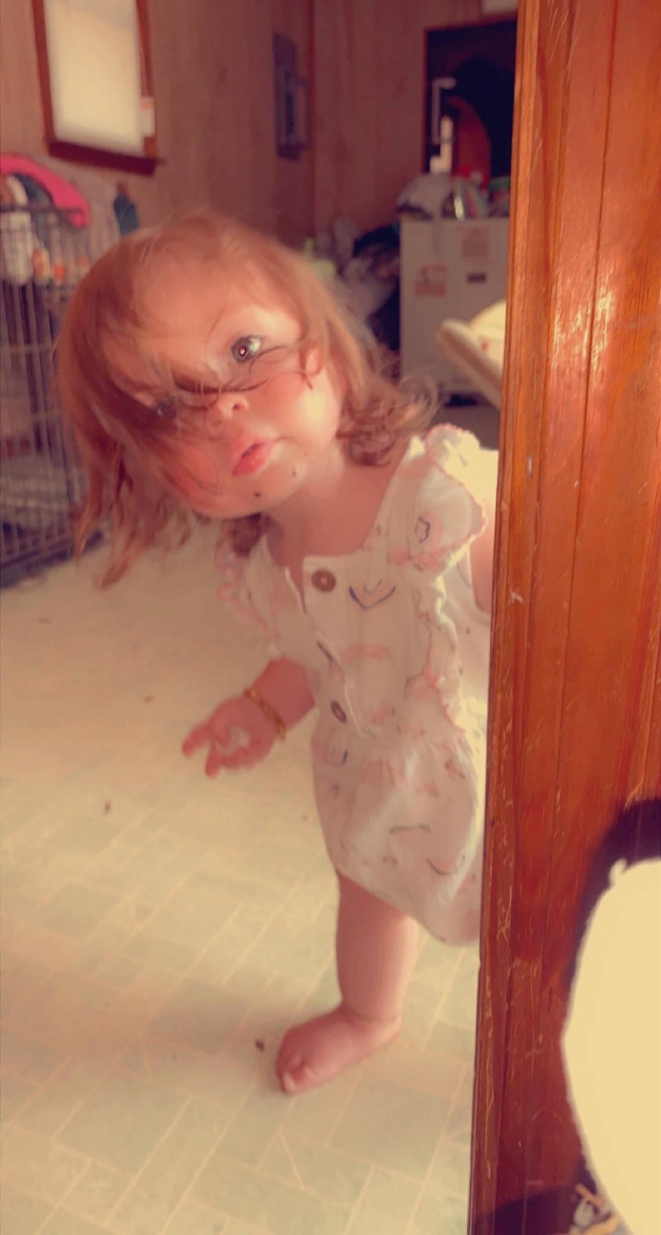 Hazley is registered to the contest to win money with this photo: arm, cabinetry, cheek, drawer, dress, eyebrow, finger, floor, flooring, hair, head, human_body, lip, mouth, neck, nose, person, shoulder, skin, sunglasses