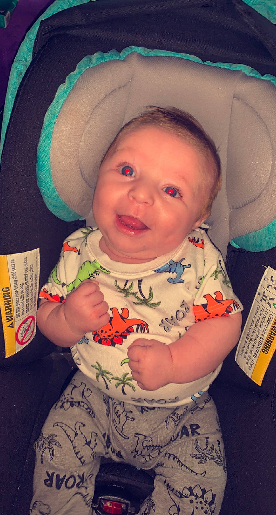 Donnie is registered to the contest to win money with this photo: baby, baby_toddler_clothing, cheek, chin, cool, eye, facial_expression, finger, fun, happy, human, iris, lip, mouth, nose, person, skin, sleeve, smile, textile