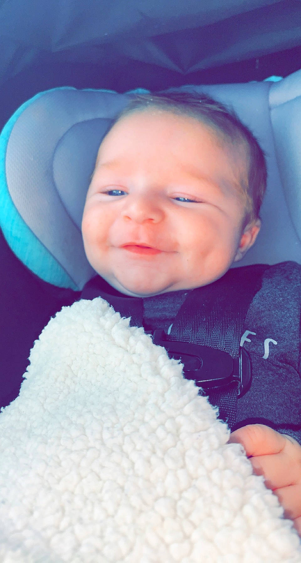 Donnie is registered to the contest to win money with this photo: azure, baby_toddler_clothing, black, blue, cheek, chin, comfort, eye, eyebrow, head, lip, mouth, nose, outerwear, person, photograph, product, purple, skin, smile