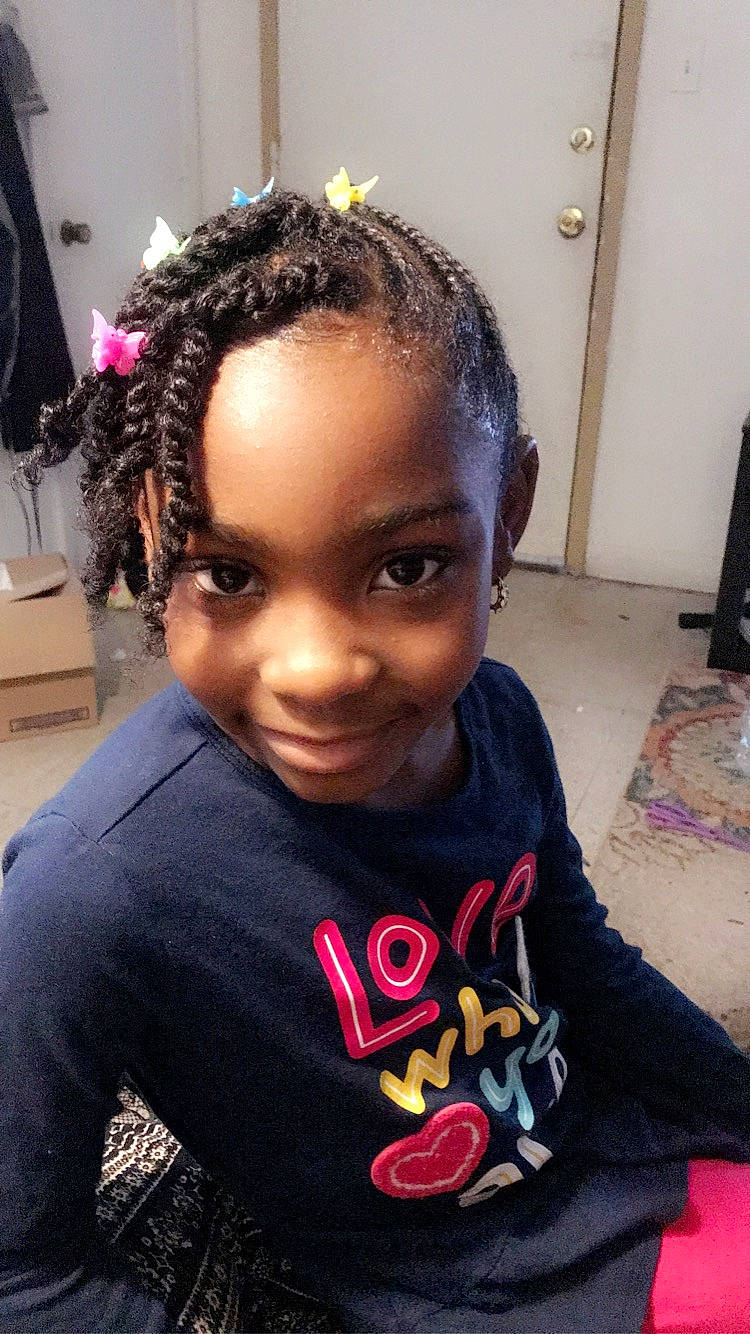 Mylee joined the competition — help win amazing prizes! black_hair, braid, child, cornrows, dreadlocks, forehead, hair, hair_accessory, hairstyle, joy, long_hair, person, s_curl, toddler