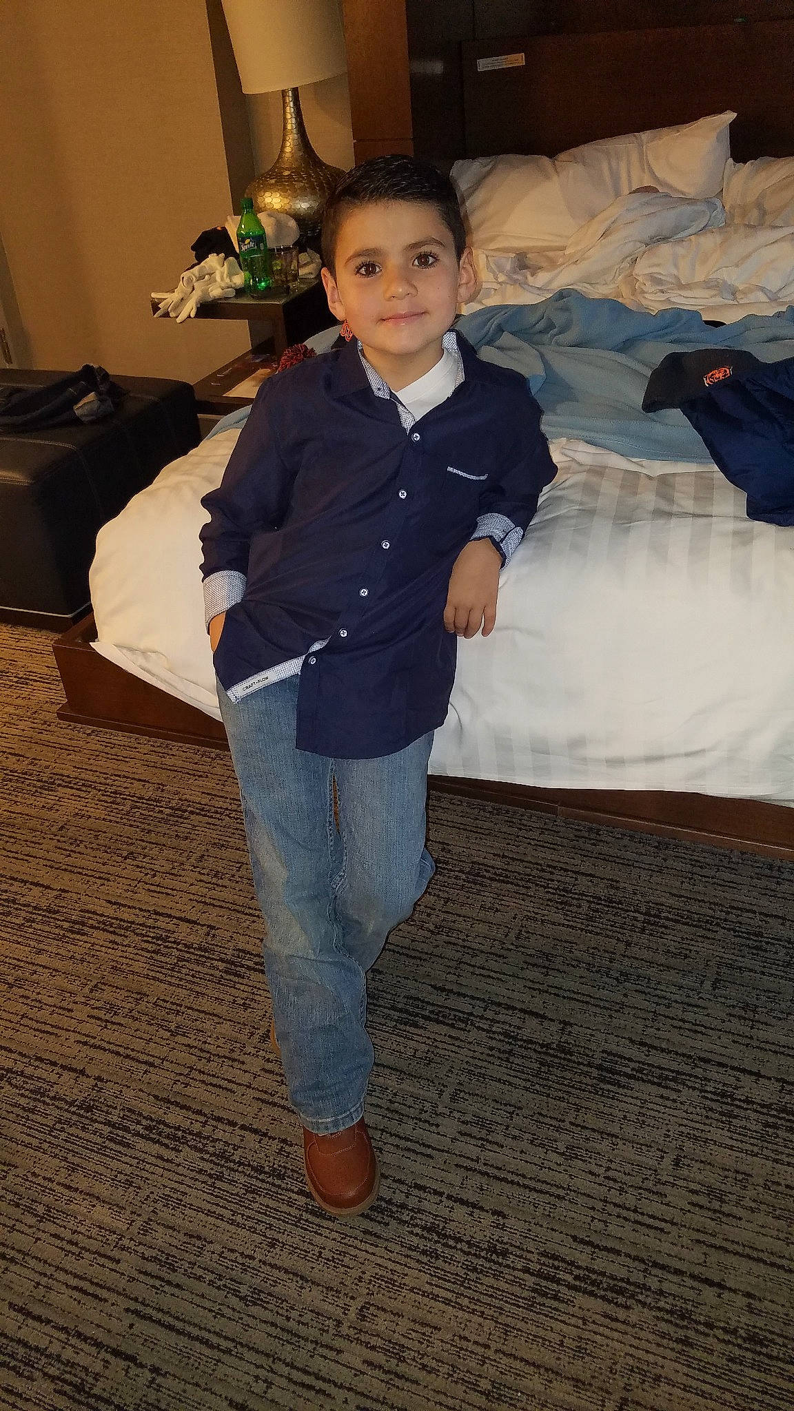 Johnny Boy joined the competition — help win amazing prizes! child, denim, flooring, footwear, fun, jeans, leg, outerwear, person, shoe, smile, standing, trousers