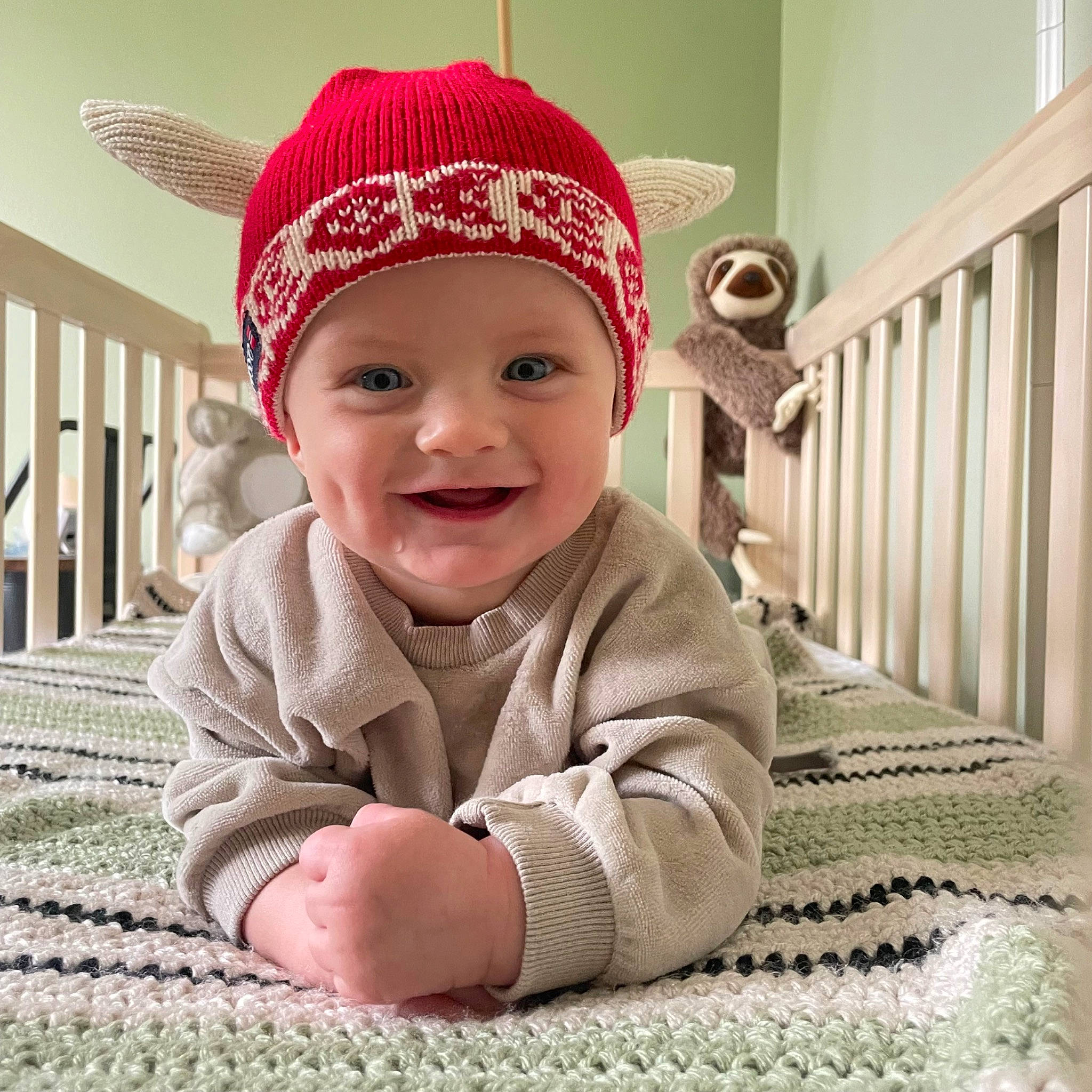Emmett joined the competition — help win amazing prizes! baby, baby_toddler_clothing, cap, cheek, chin, comfort, eye, face, flooring, happy, head, headgear, headwear, joy, nose, outerwear, pattern, person, skin, sleeve
