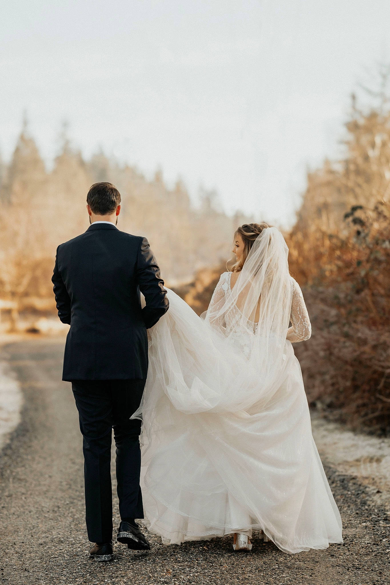 Emmett is registered to the contest to win money with this photo: bridal_accessory, bridal_clothing, bridal_party_dress, bridal_veil, bride, dress, event, flash_photography, formal_wear, friendship, gesture, gown, happy, landscape, people_in_nature, person, sky, trousers, veil, wedding_ceremony_supply