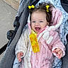 Gemma joined the competition — help win amazing prizes! baby, child, smiling, happy, cozy, fuzzy_outfit, pink_clothing, white_clothing, yellow_bows, hair_accessories, stroller, blanket, comfort, outdoor, person, infant, cute, portrait, hand, blue_eyes
