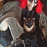 dog, puppy, animal, pet, scarecrow, costume, halloween, spooky, creepy, portrait, sitting, indoors, fabric, red_hair, mask, face, dark, dramatic, companion, funny