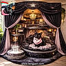 cat, black_cat, pet, indoor, luxury, throne, curtains, chandelier, plush_bed, pink_scarf, fountain, plant, window, decor, cushion, shelf, lighting, portrait, funny_face, inset_photo