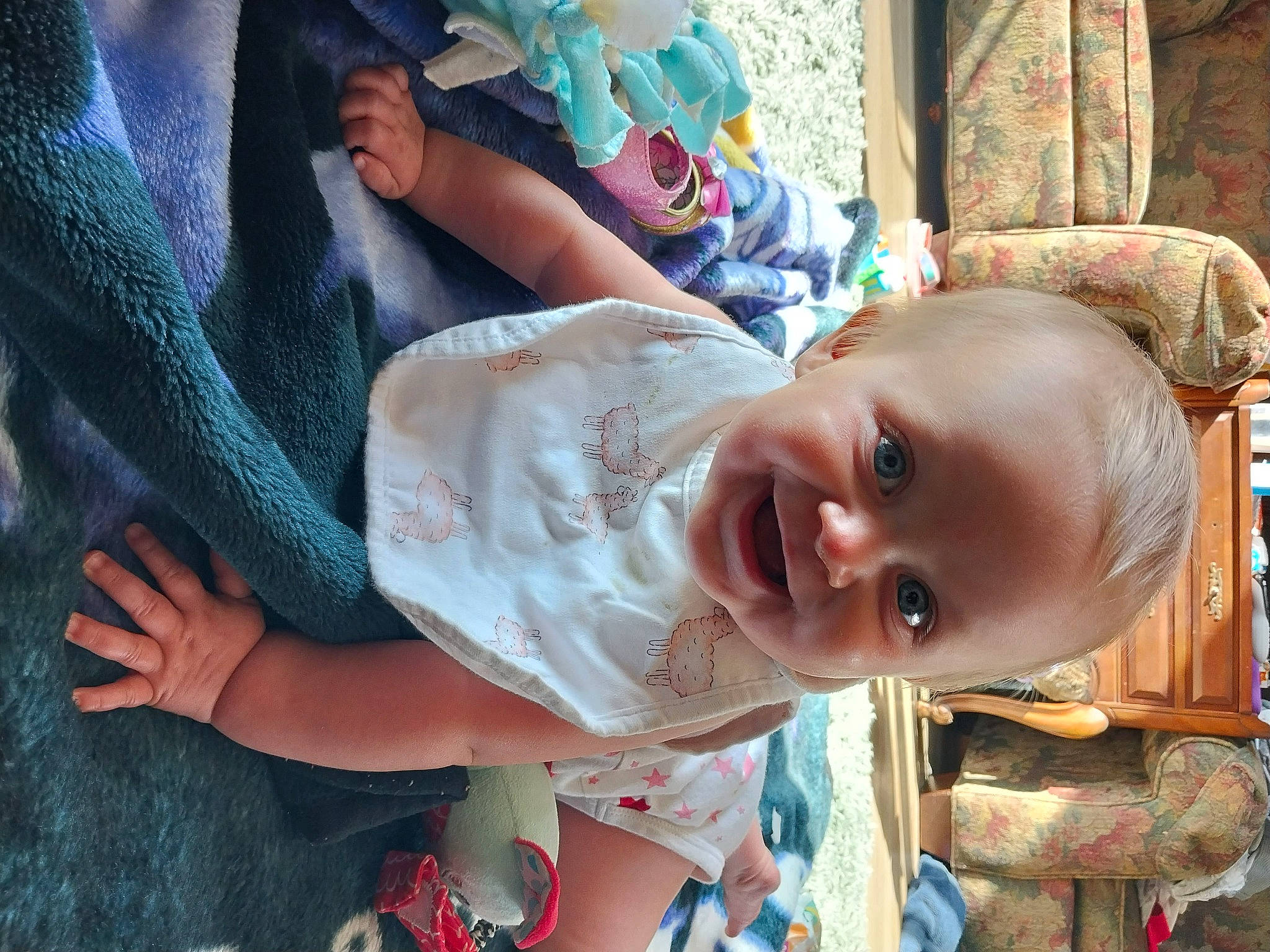 Rebecca joined the competition — help win amazing prizes! baby, blue, cheek, child, fun, grass, green, happy, hat, headgear, joy, laugh, leisure, mouth, nose, person, play, sitting, skin, smile