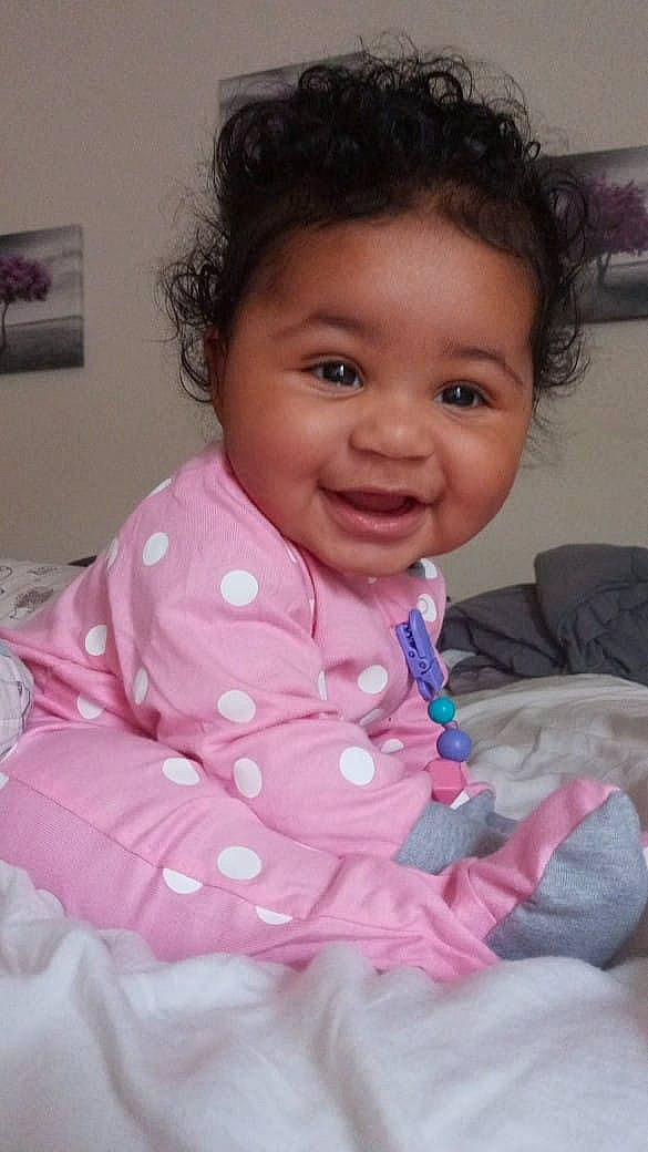 Sierra joined the competition — help win amazing prizes! baby, baby_toddler_clothing, cheek, comfort, eye, eyelash, happy, head, iris, joy, lip, magenta, mouth, nose, person, picture_frame, pink, purple, skin, sleeve