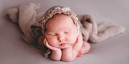 Kamrynn joined the competition — help win amazing prizes! newborn, baby, infant, sleeping, portrait, cute, face, hands, bonnet, soft_texture, blanket, neutral_colors, peaceful, closeup, studio, resting, adorable, skin, headwear, young_child