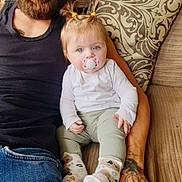 Bonnie joined the competition — help win amazing prizes! baby, child, pacifier, blue_eyes, pigtails, tattoo, adult, arm, couch, pillow, clothing, long_sleeve, pants, socks, jeans, black_shirt, indoor, sitting, cute, comfort