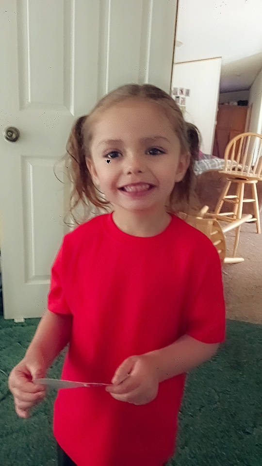 Destinee joined the competition — help win amazing prizes! baby_toddler_clothing, blond, chair, cheek, child, door, flooring, fun, hair, happy, iris, joy, pattern, person, room, sitting, sleeve, smile, standing, t_shirt