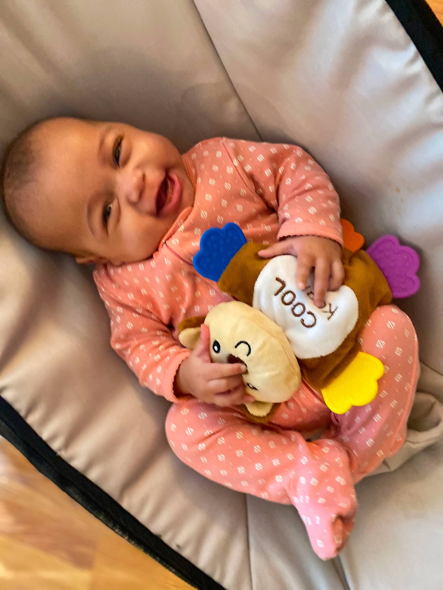 Amyra joined the competition — help win amazing prizes! baby, baby_products, baby_sleeping, baby_toddler_clothing, cheek, child, comfort, happy, infant_bed, linens, orange, person, pink, product, sleeve, smile, stuffed_toy, textile, toddler, toy