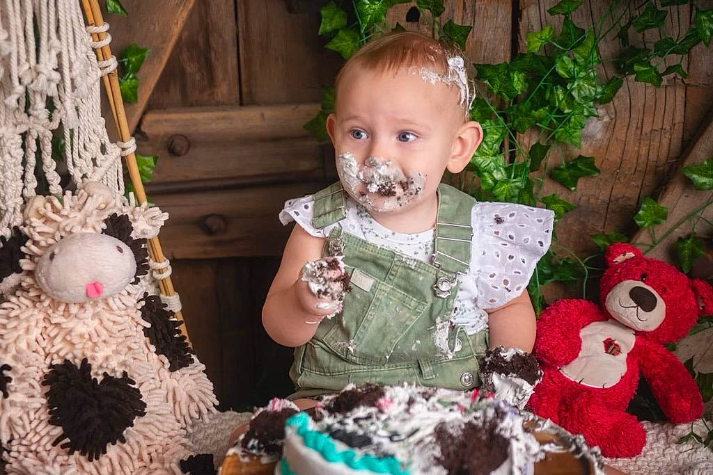 Kailena is registered to the contest to win money with this photo: baby, baby_toddler_clothing, child, christmas, christmas_eve, christmas_ornament, doll, dress, event, happy, holiday, pattern, person, plant, sitting, stuffed_toy, sugar_cake, sweetness, toddler, wood