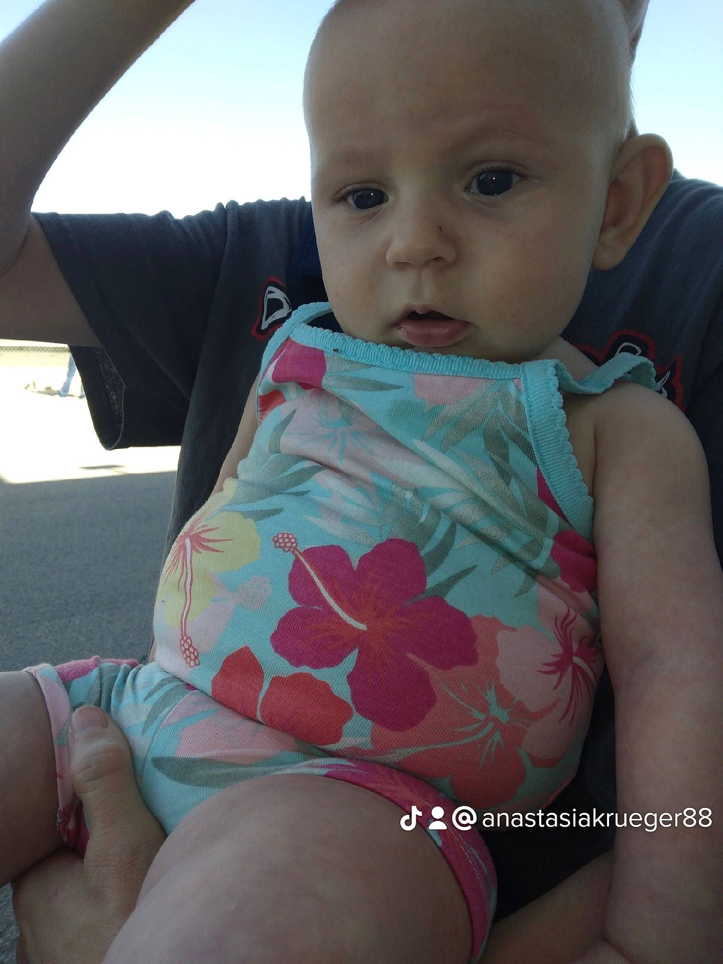 Kailena Zai Ann Krueger is registered to the contest to win money with this photo: arm, azure, baby_toddler_clothing, cool, finger, hairstyle, hand, happy, head, human_body, interaction, leg, mouth, neck, organ, person, shoulder, skin, sky, steering_wheel