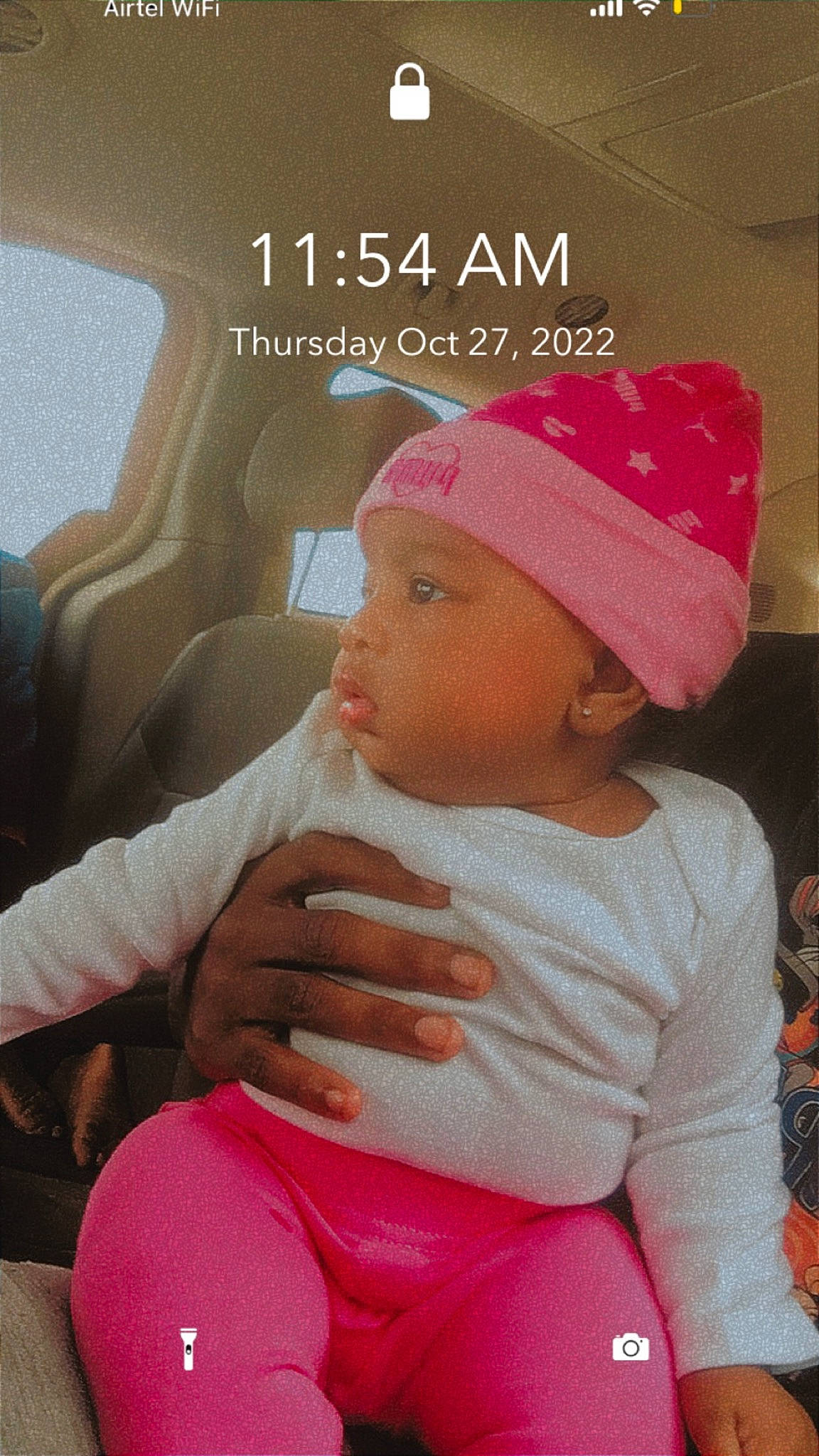 Legacy is registered to the contest to win money with this photo: baby, baby_toddler_clothing, baseball_cap, cap, chair, cheek, child, comfort, cool, eye, finger, hairstyle, happy, head, headgear, headwear, knit_cap, lap, person, pink