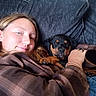 Zeus joined the competition — help win amazing prizes! blanket, bracelet, comfort, couch, cozy, cute, dog, face, fur, hand, home, indoor, person, pet, plaid_shirt, puppy, relaxing, resting, rottweiler, snuggling