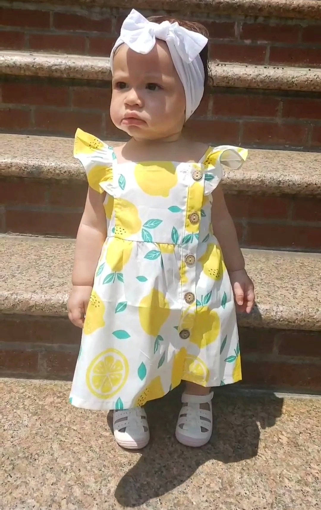 Giana joined the competition — help win amazing prizes! baby, baby_toddler_clothing, cap, child, costume, day_dress, dress, face, fun, happy, hat, headwear, human_leg, leisure, pattern, person, recreation, sleeve, street_fashion, sun_hat