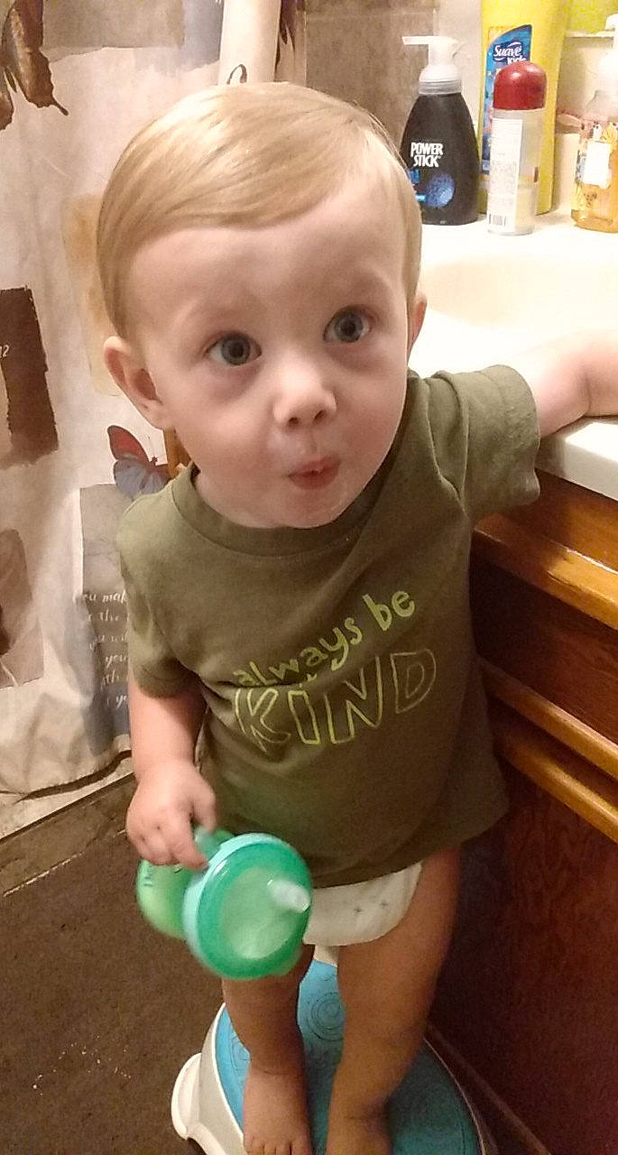 Aiden is registered to the contest to win money with this photo: arm, baby, baby_toddler_clothing, balloon, cheek, child, eyelash, face, finger, hair, hand, happy, head, iris, nose, organ, person, skin, sleeve, surprise