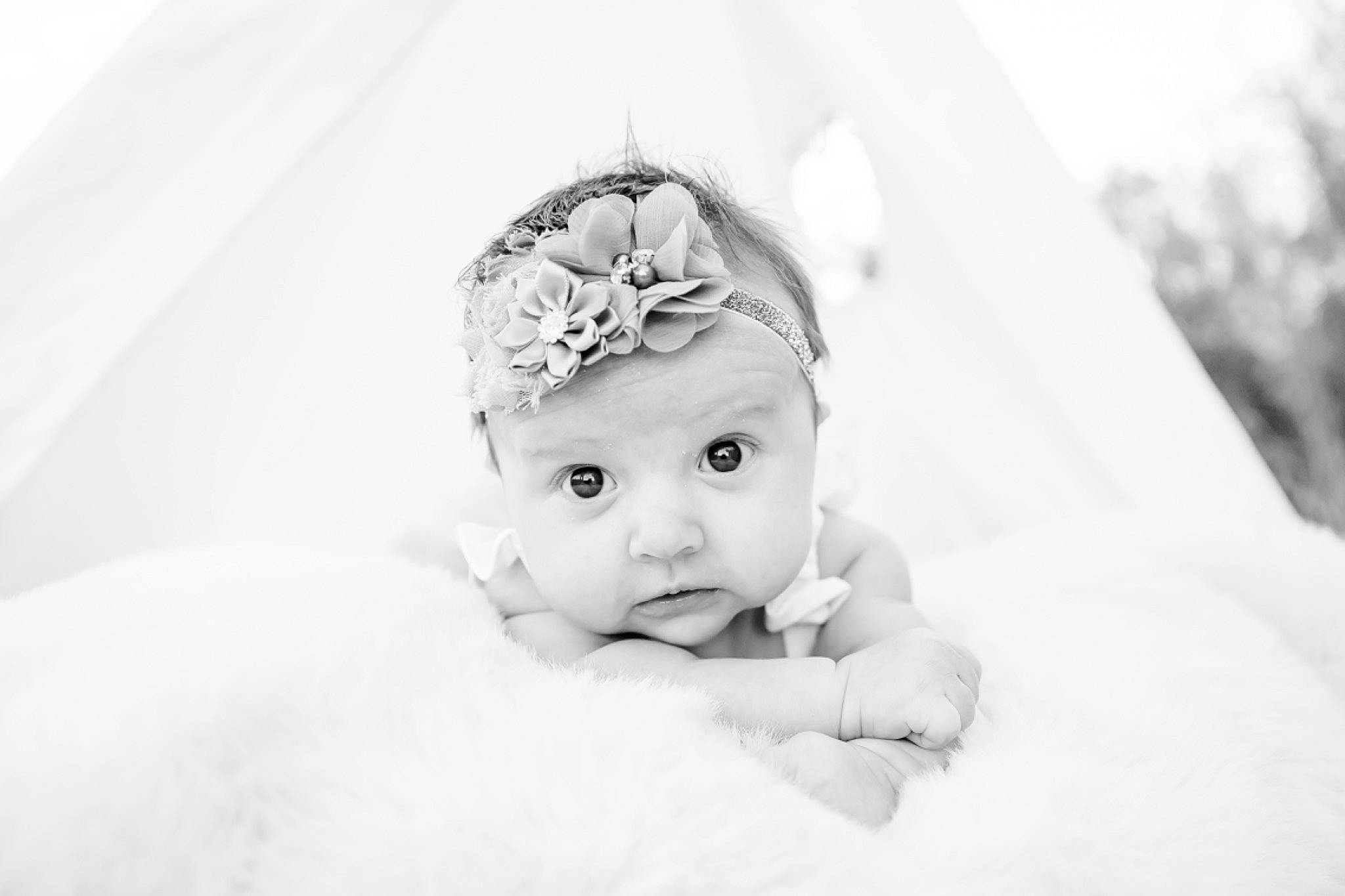 Brynnleigh is registered to the contest to win money with this photo: baby, baby_toddler_clothing, cap, child, comfort, eyelash, fashion_accessory, flash_photography, fur, hair_accessory, happy, headband, headgear, headpiece, linens, monochrome, monochrome_photography, person, portrait_photography, room