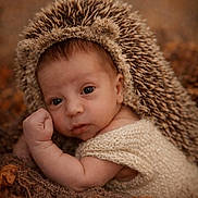 Lorenzo joined the competition — help win amazing prizes! autumn, baby, blanket, child, costume, cozy, cute, expression, face, hedgehog_hat, infant, knitted_clothing, leaves, lying_down, nature, pinecone, portrait, soft_light, warm_colors, young_child