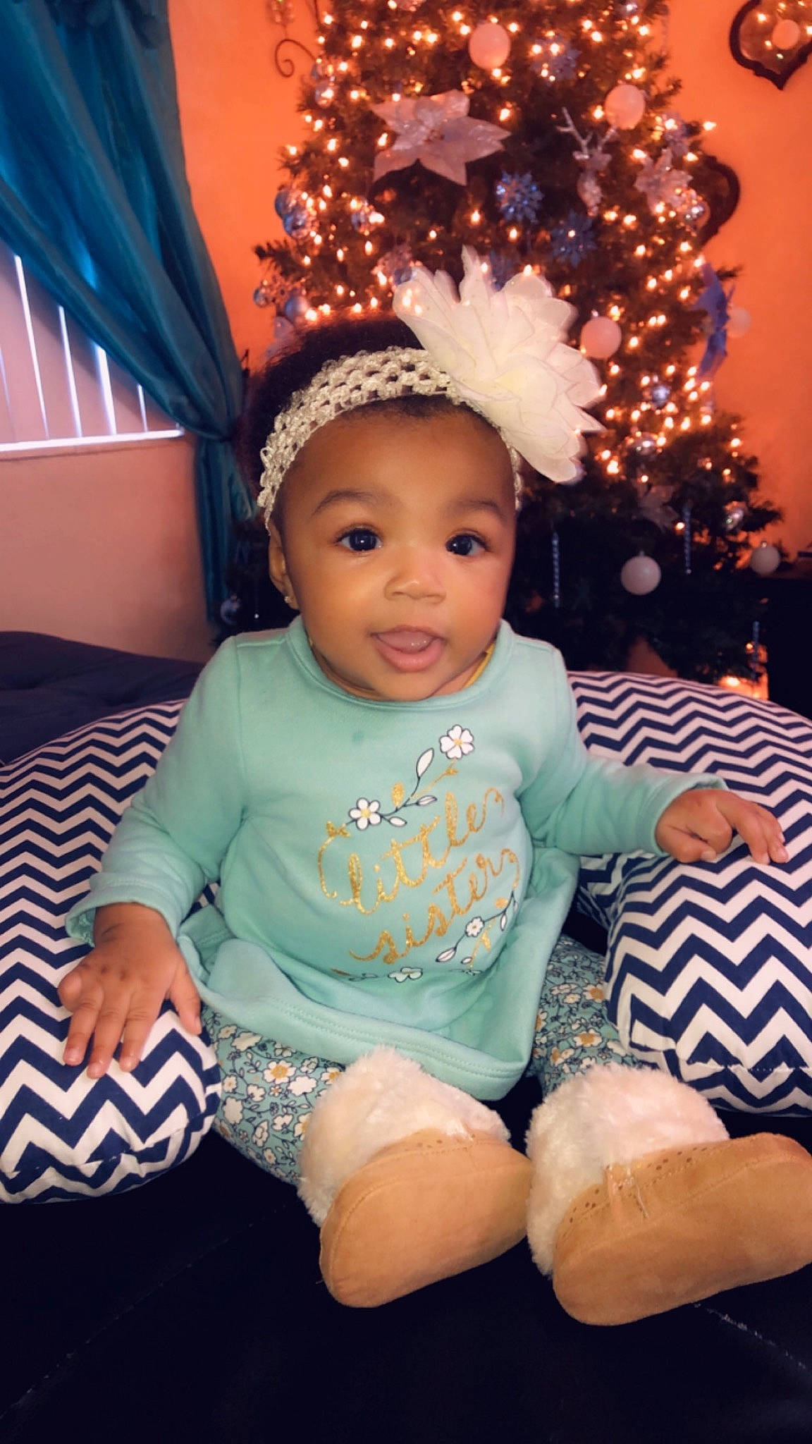 Kalani joined the competition — help win amazing prizes! baby, baby_toddler_clothing, child, christmas, fashion_accessory, hair_accessory, head, headgear, headpiece, person, smile, toddler