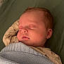 Milo joined the competition — help win amazing prizes! baby, sleeping, blanket, knit, cozy, onesie, bedspread, infant, peaceful, face, head, child, rest, nap, soft, warm, comfort, portrait, indoors, closeup