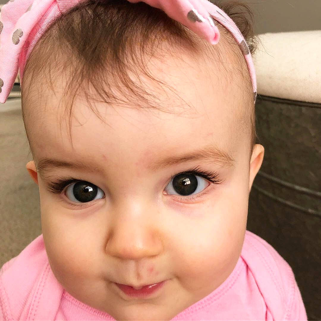 Lilyana is registered to the contest to win money with this photo: baby, beauty, cheek, child, chin, close_up, ear, eye, eyebrow, face, facial_expression, forehead, hair, hair_accessory, head, lip, nose, person, pink, skin