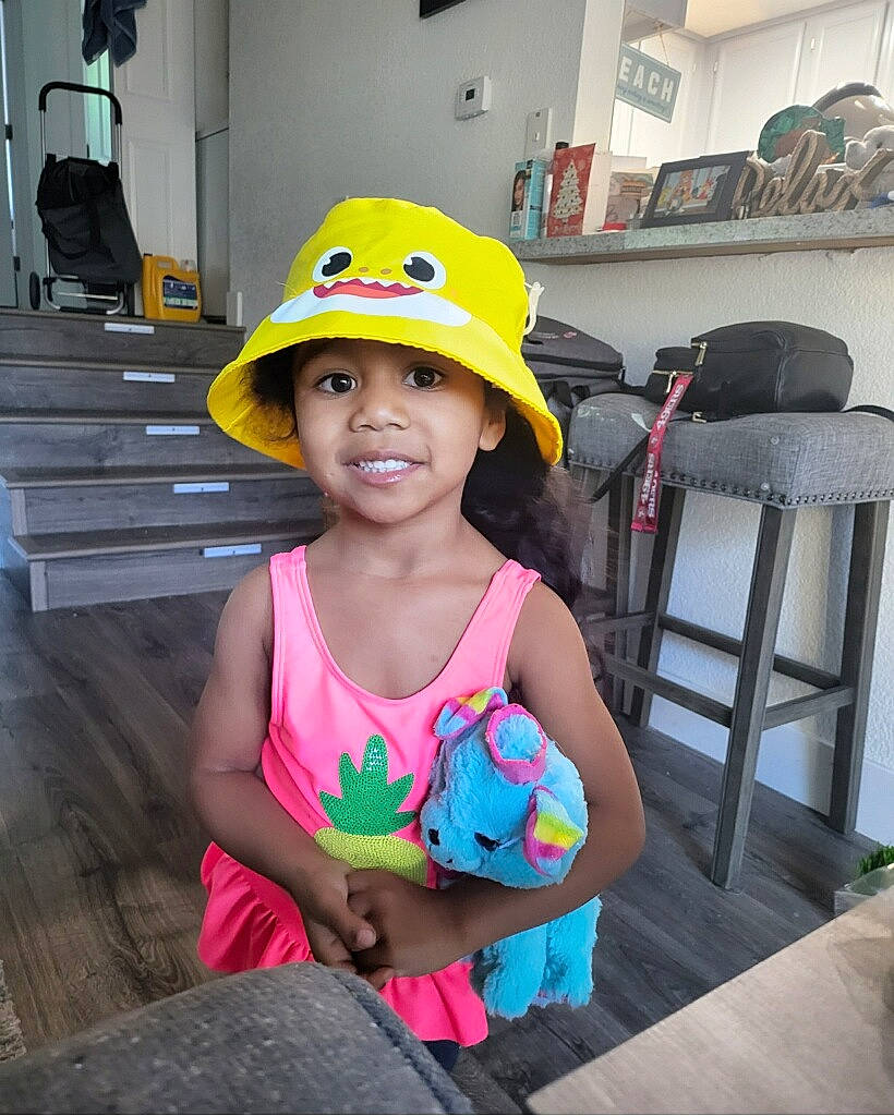 Zaylah joined the competition — help win amazing prizes! chair, child, clothing, electric_blue, event, eye, fashion_accessory, fun, happy, hard_hat, hat, headwear, helmet, joy, leisure, magenta, person, personal_protective_equipment, product, recreation