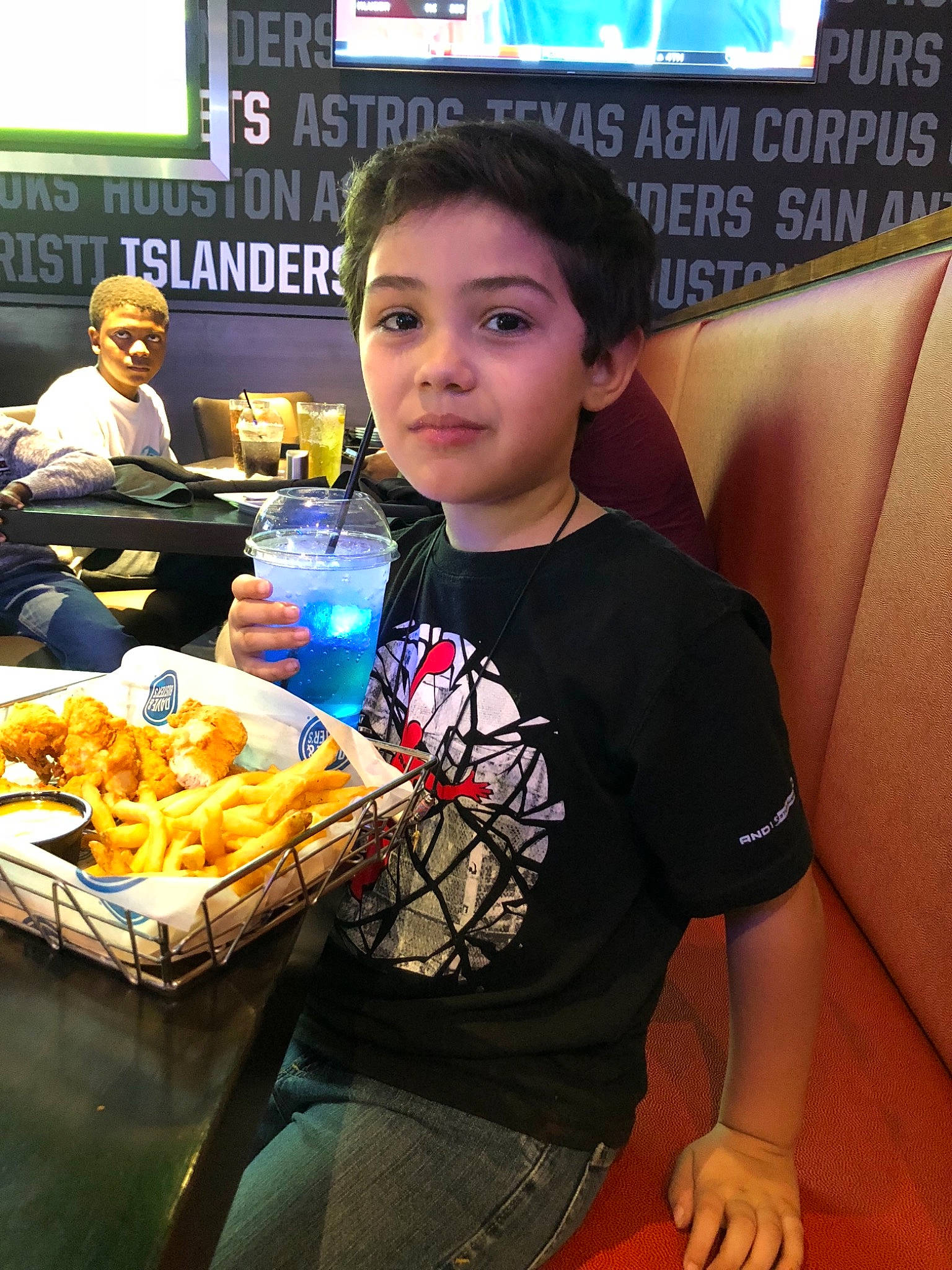 Dominic is registered to the contest to win money with this photo: cuisine, dish, eating, fast_food, fast_food_restaurant, food, headwear, junk_food, meal, person, side_dish, snack, street_food