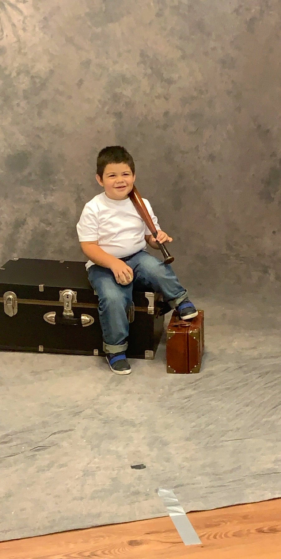 Evan is registered to the contest to win money with this photo: joy, musical_instrument, person, sitting