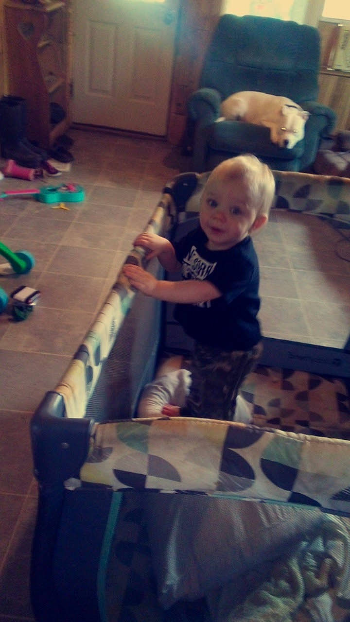 Coleson is registered to the contest to win money with this photo: baby, child, cloud, door, floor, flooring, fun, happy, hardwood, human_leg, laminate_flooring, leisure, person, play, recreation, room, sitting, thigh, toddler, wood