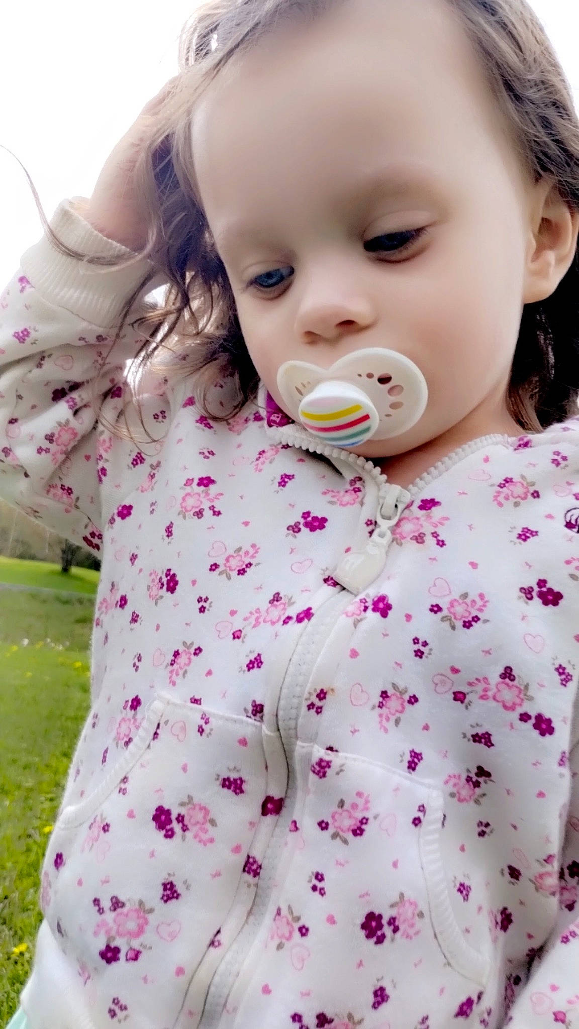 Harper joined the competition — help win amazing prizes! baby, baby_toddler_clothing, cheek, child, collar, eyelash, face, gesture, grass, happy, head, lip, nose, outerwear, pattern, people_in_nature, person, pink, skin, sleeve