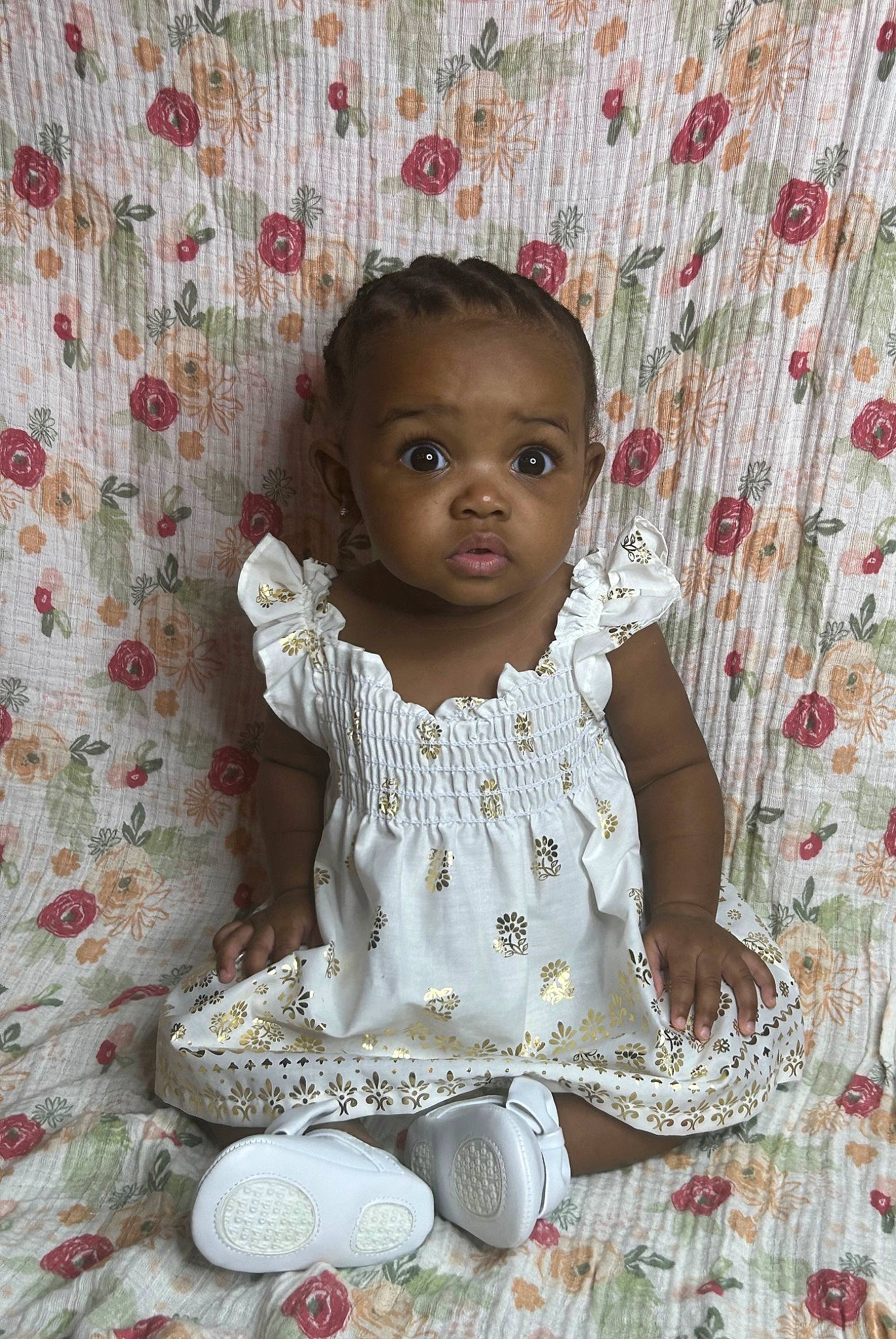 Alaya is registered to the contest to win money with this photo: baby, baby_toddler_clothing, cheek, child, dress, embellishment, eye, face, happy, head, linens, pattern, person, pink, portrait_photography, sitting, skin, sleeve, tableware, toddler