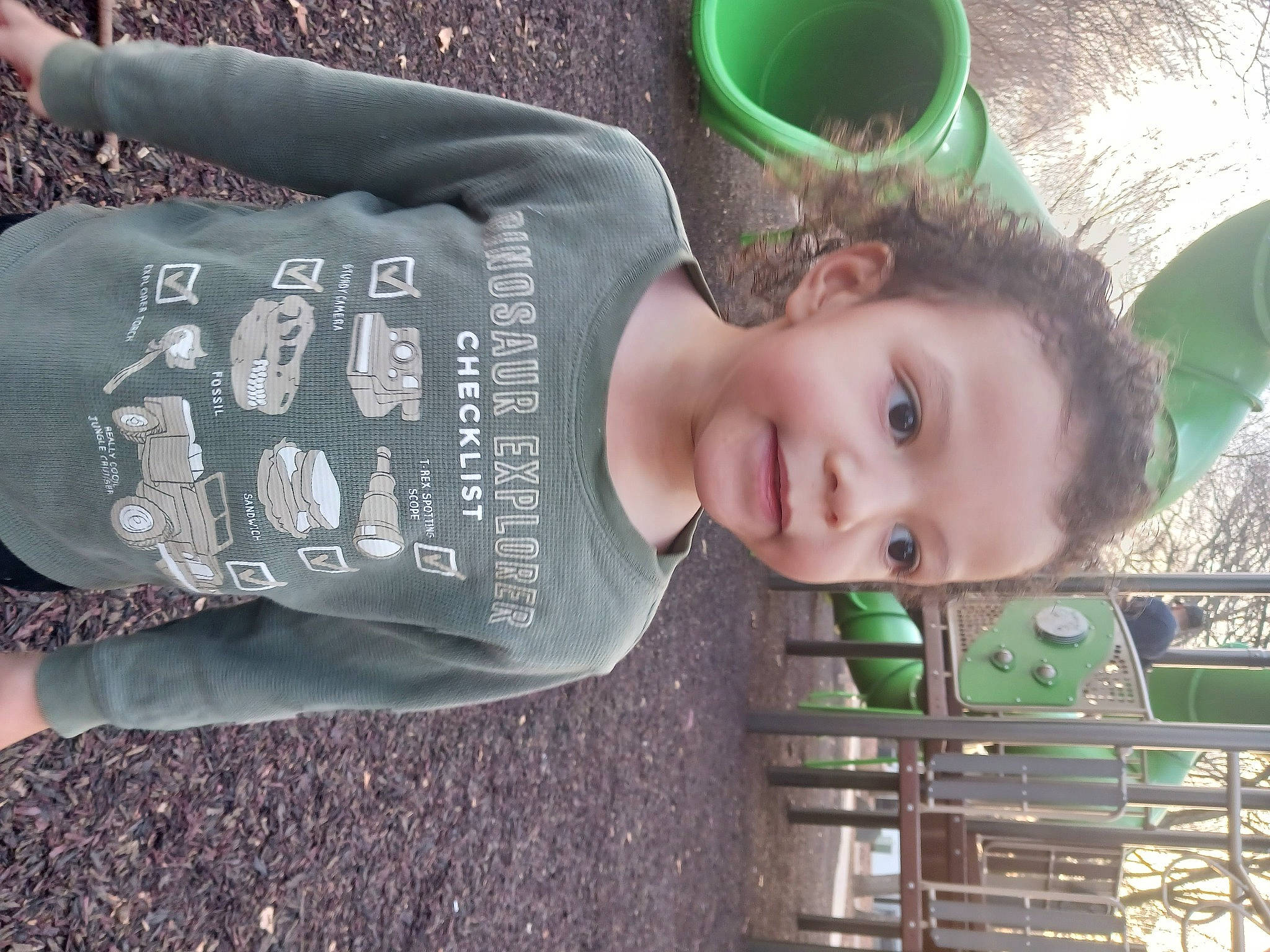 Earl Wulf is registered to the contest to win money with this photo: automotive_wheel_system, child, cup, eyewear, fun, grass, green, happy, leisure, person, photograph, plant, play, product, sitting, sleeve, smile, snapshot, soil, toddler