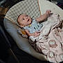 Myralyn is registered to the contest to win money with this photo: baby, blanket, baby_seat, indoor, furniture, person, child, cute, infant, owl_pattern, soft_toy, relaxing, curious, looking_up, cozy, clothing, floor, chair, household_items, casual
