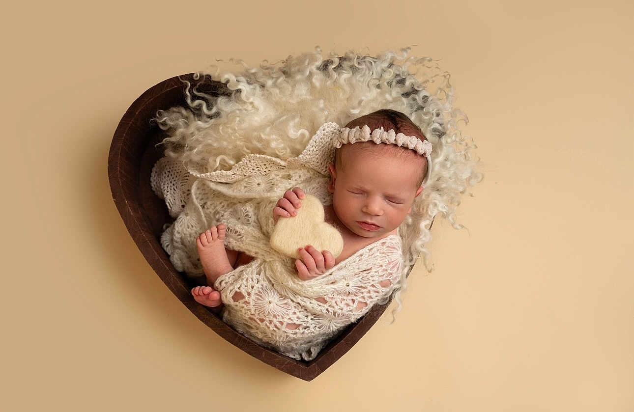 Elora-Rose joined the competition — help win amazing prizes! newborn, baby, sleeping, heart_shaped_bowl, knit_blanket, wool, headband, soft_toy, peaceful, infant, wrapped, cozy, cute, portrait, studio, warm_colors, skin, tiny_feet, hand, resting