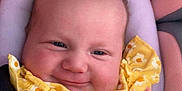 Chayanna joined the competition — help win amazing prizes! baby, car_seat, child, comfort, cute, expression, face, hand, happy, infant, pink, plush, portrait, seat_belt, sitting, skin, smile, wearing, yellow_clothing, young